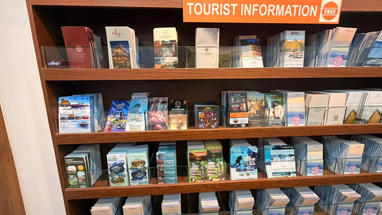 Brochure display at the KTI Bali counter